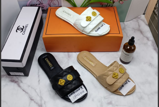 Chanel Quilted Medallion Slides